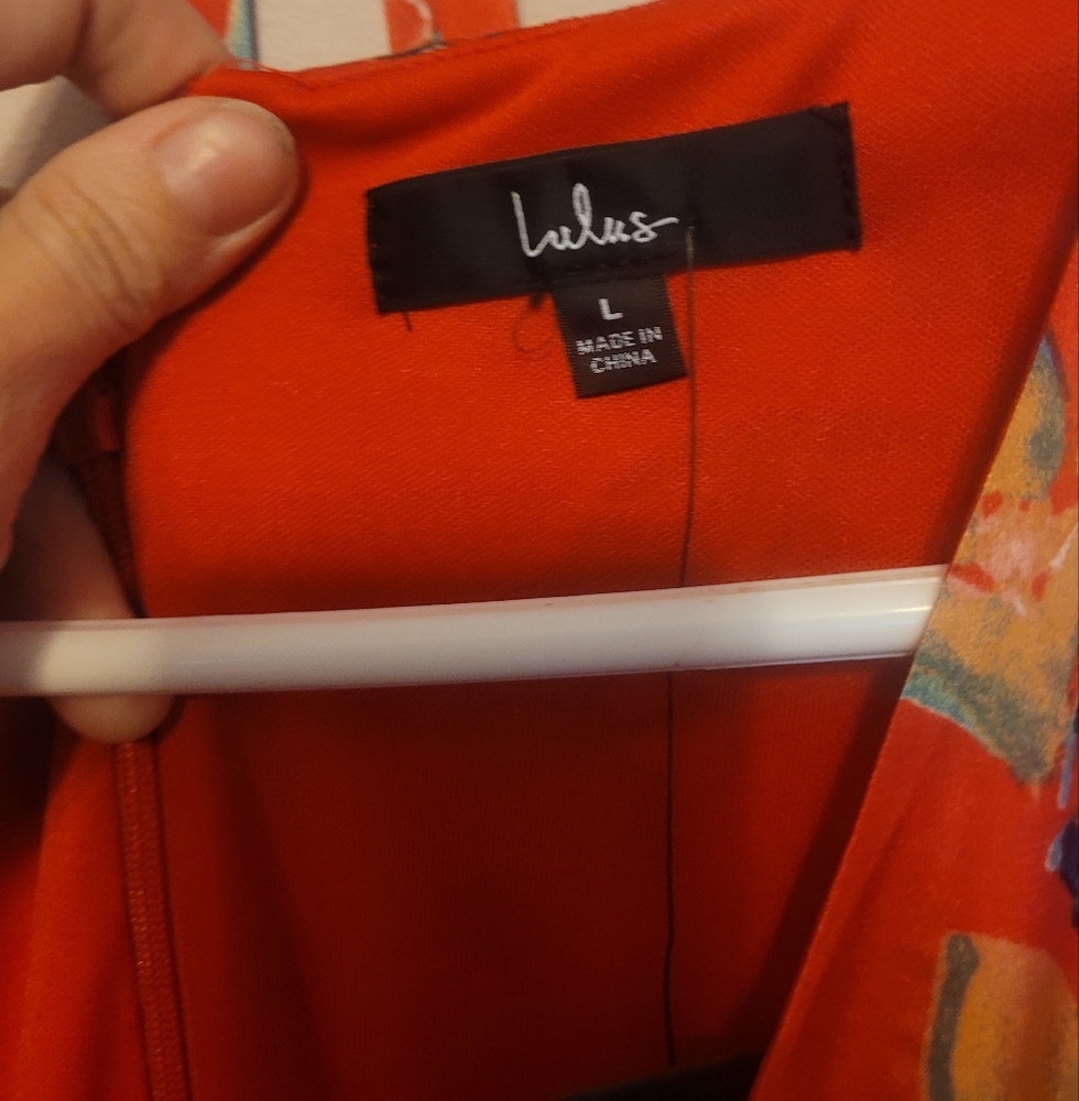 Beautiful red dress. Never worn with tags, size 10.